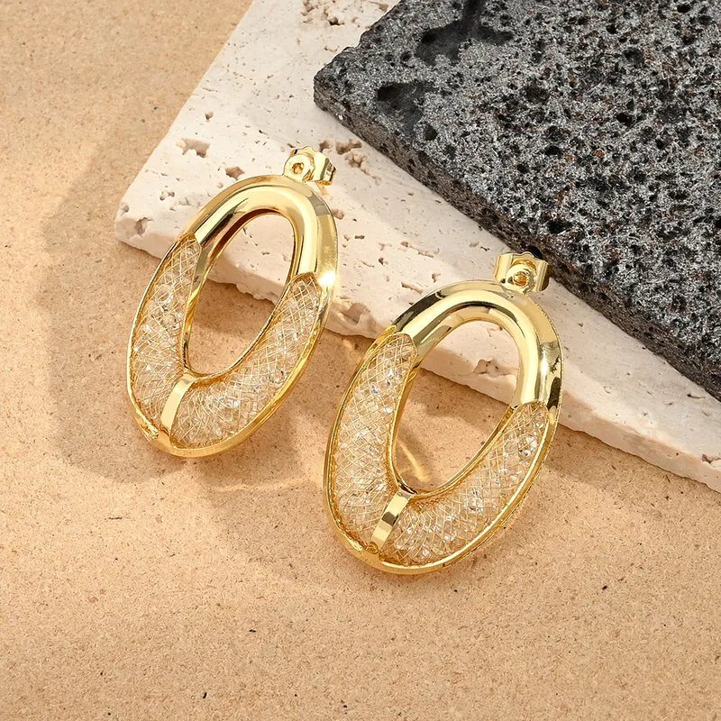 skoularikia-gunaikeia-atsalina-kosmima-onlien (19) Σκουλαρίκια Kουμπωτά Οβαλ - Χρυσό - Image 1