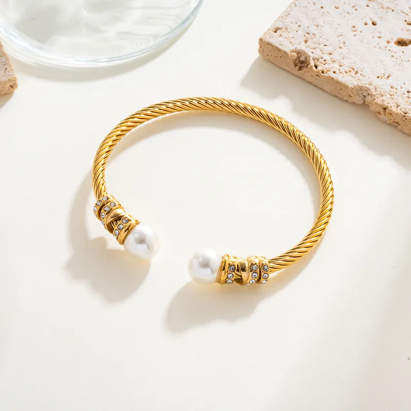 gunaikeia-vraxiolia-atsalina-kosmima-online (97) Βραχιόλι Open Πλεκτό με Πέρλες στα Τελειώματα - Χρυσό - Image 1