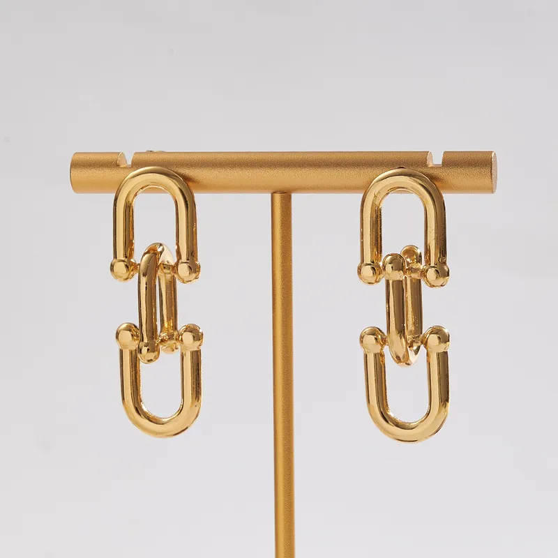 skoularikia-gunaikeia-kosmima-online-atsalina-dixrwma-xrisa-asimi (117) Σκουλαρίκια Κουμπωτά Tied Link - Χρυσό - Image 1