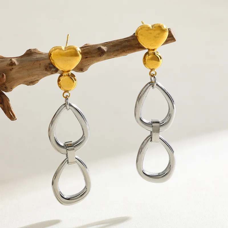 skoularikia-gunaikeia-kosmima-online-atsalina-dixrwma-xrisa-asimi (177) Σκουλαρίκια Κουμπωτά Hanging Hoops - Δίχρωμο - Image 1