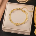 gunaikeio-atsalino-vraxioli-den-mavrizei-xriso-asimi-dixromo-strass-prasino-mple-kosmima-online
