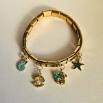 gunaikeio-vraxioli-cuff-xriso-atsali-charms-kremasta-kosmima-online